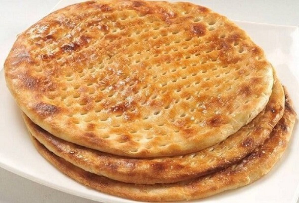 "الأفغاني وصل" طريقة عمل خبز التميس الأفغاني هش ومحمص وطعمه خرافي ورائحة تجيب اخر الشارع 5 “الأفغاني وصل” طريقة عمل خبز التميس الأفغاني هش ومحمص وطعمه خرافي ورائحة تجيب اخر الشارع