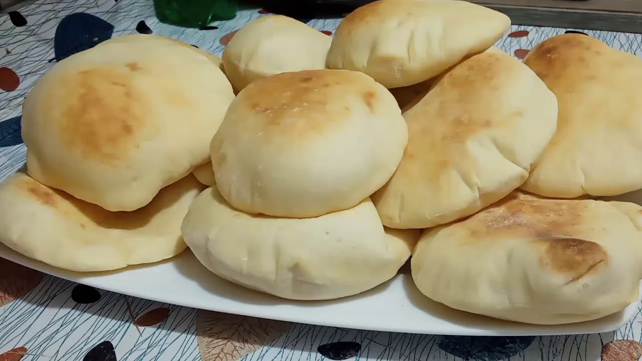 العيش الشامي الصغير بتاع الفول والطعميه.. طريقة تحضيره في المنزل بكل بساطة 5 العيش الشامي الصغير بتاع الفول والطعميه.. طريقة تحضيره في المنزل بكل بساطة
