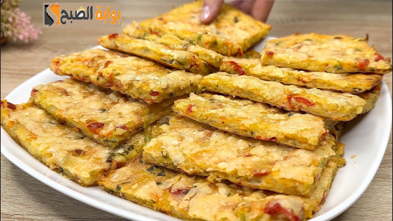 ألذ من البيتزا اعملي فطيرة البطاطس المبشورة مع إضافات بسيطة مذاقها رائع 5 ألذ من البيتزا اعملي فطيرة البطاطس المبشورة مع إضافات بسيطة مذاقها رائع