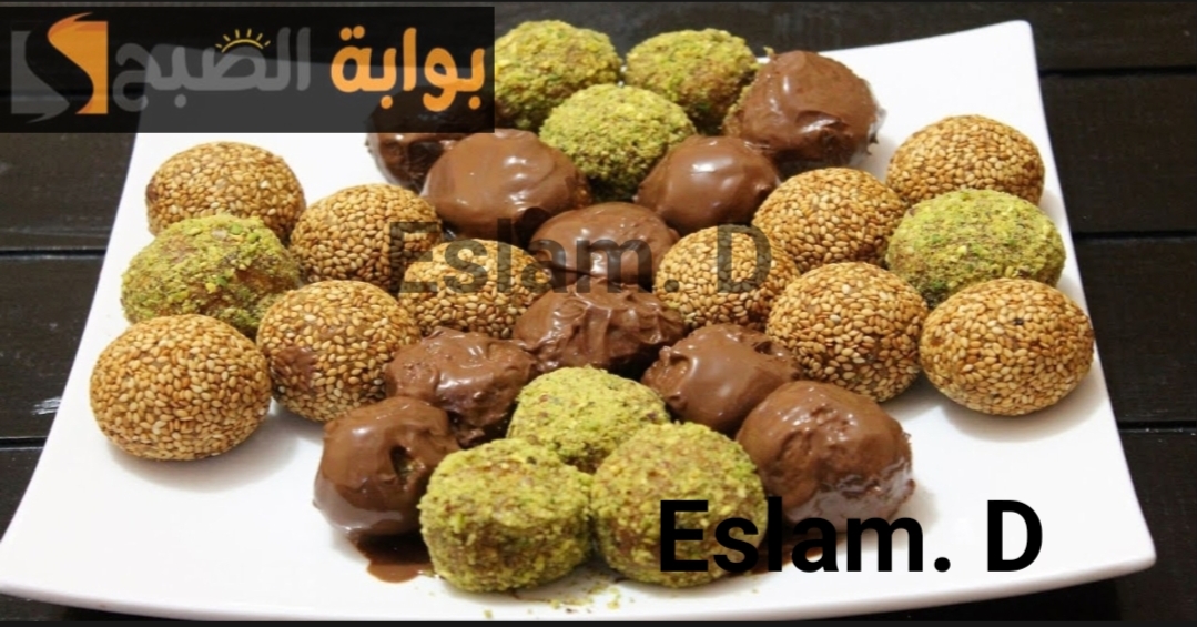 لعزومات رمضان..طريقة عمل حلوى كرات التمر الشهية بأقل الإمكانيات وهتكفي عدد كثير!! 5 لعزومات رمضان..طريقة عمل حلوى كرات التمر الشهية بأقل الإمكانيات وهتكفي عدد كثير!!
