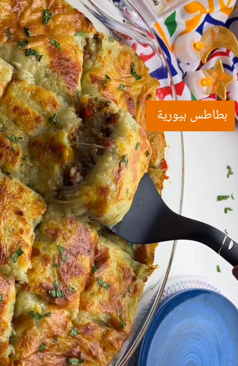 صينية البطاطس البيورية باللحم المفروم.. وصفة بتجنن بمكونات بسيطة وطعمها لذيذ 10 صينية البطاطس البيورية باللحم المفروم.. وصفة بتجنن بمكونات بسيطة وطعمها لذيذ