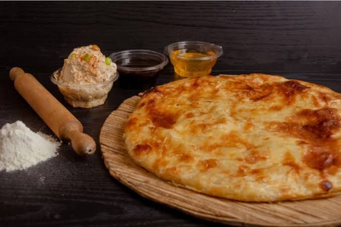 من قلب الفلاحين.. طريقة عمل الفطير المشلتت على أصوله مورق وزبده يفتح نفس!