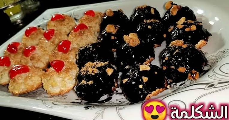 بتاعت المحلات.. طريقة عمل حلوى الشكلمة بجوز الهند في البيت بأسرار أشهر الشيفات وطعم لا يقاوم 5 بتاعت المحلات.. طريقة عمل حلوى الشكلمة بجوز الهند في البيت بأسرار أشهر الشيفات وطعم لا يقاوم