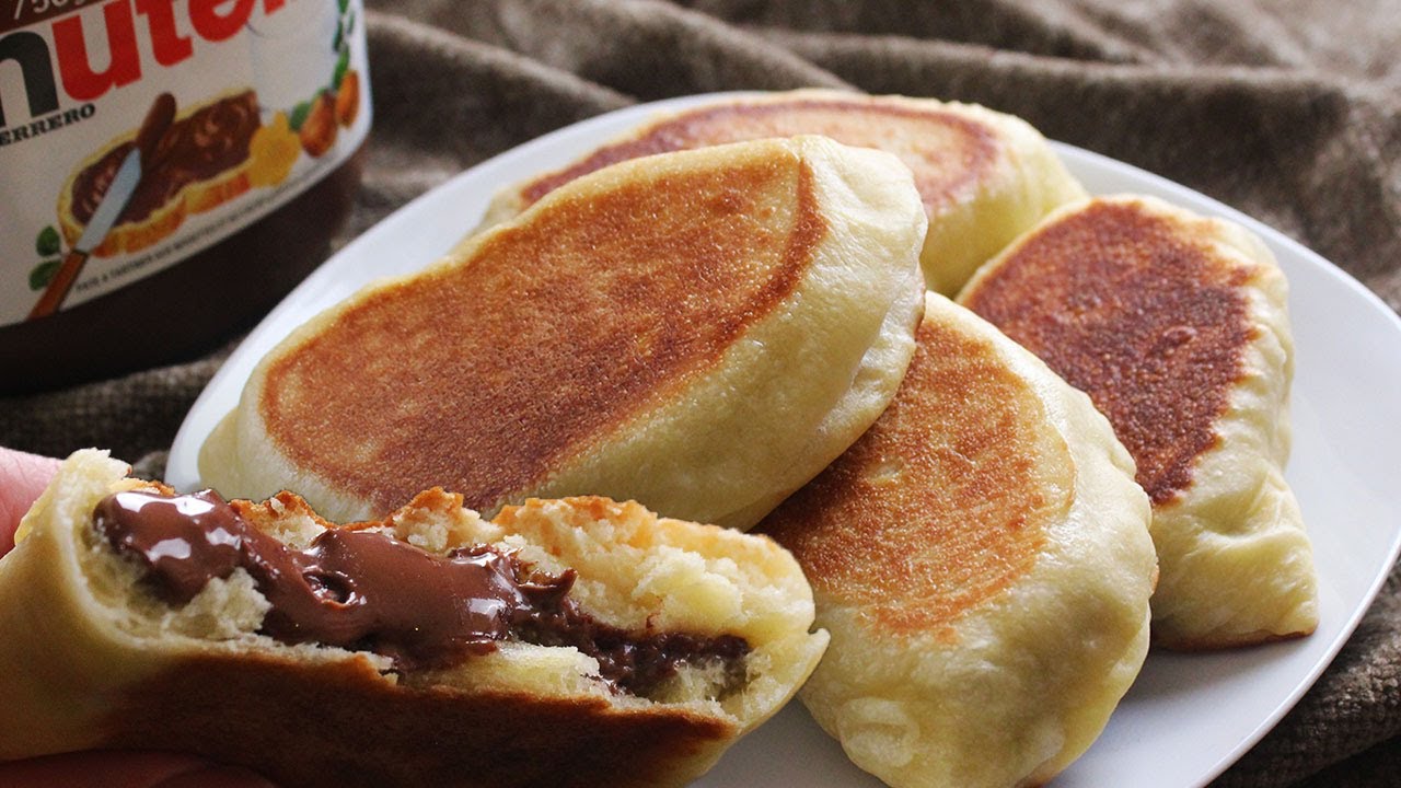 فطائر النوتيلا في الطاسة بقوام طري مورق وطعم خرافي هتعمليها كل يوم من حلاوتها 5 فطائر النوتيلا في الطاسة بقوام طري مورق وطعم خرافي هتعمليها كل يوم من حلاوتها