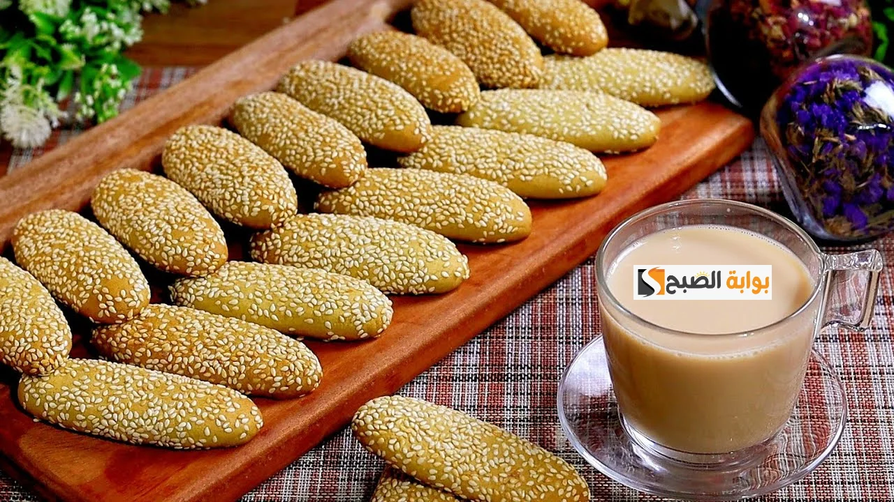 أحلى من كدة مافيش .. طريقة عمل كعك الشاي بالسمسم زي بتاع المخابز ودايب في الفم 5 أحلى من كدة مافيش .. طريقة عمل كعك الشاي بالسمسم زي بتاع المخابز ودايب في الفم