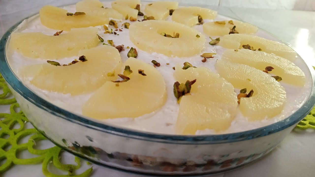 كيكة الأناناس وجوز الهند أحلى وصفة كيك جربوها بأسهل طريقة 5 كيكة الأناناس وجوز الهند أحلى وصفة كيك جربوها بأسهل طريقة