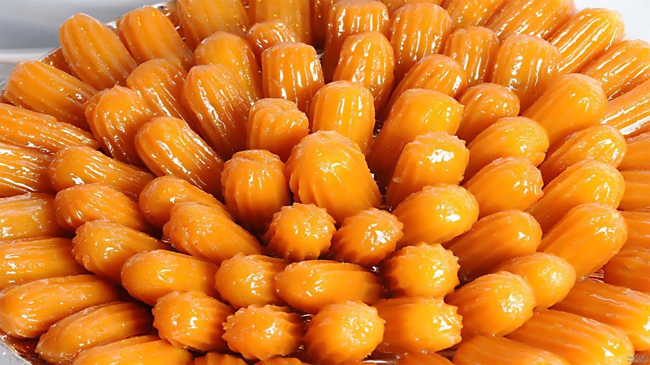 من حلويات رمضان الرائعة.. طريقة عمل بلح الشام على أصوله خطوة بخطوة