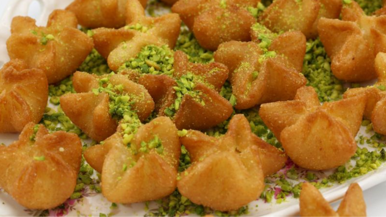 وصفة حلويات بطريقة عبقرية حلى نجمات السميد بتذوب في الفم بكوب سميد وكوب دقيق