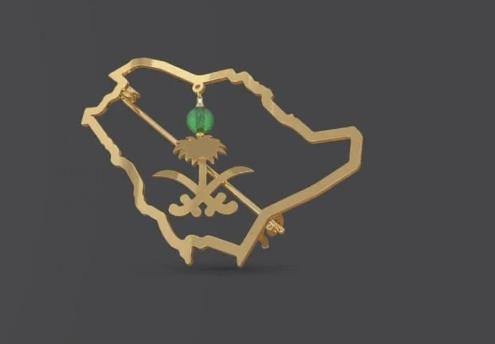 بروش اليوم الوطني السعودي 2024 تحمل شعارات المملكة للكبار والأطفال