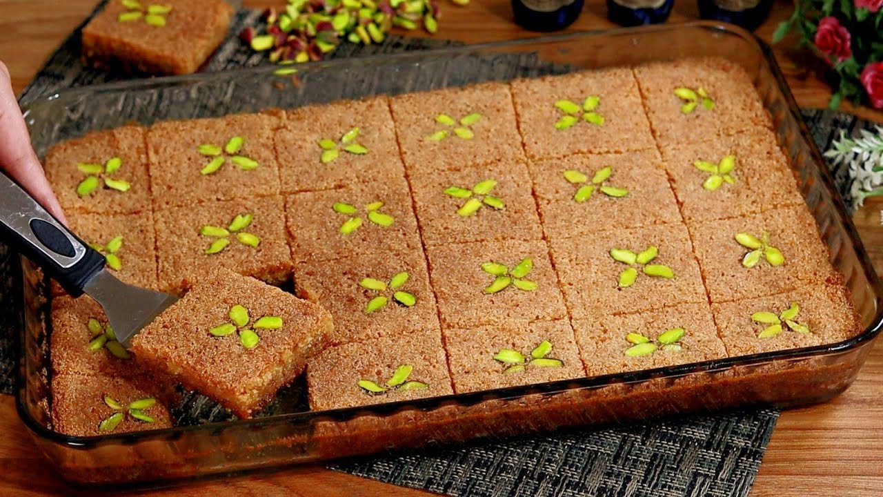 ألذ صنية بسبوسة يمكنك تحضيرها مثل الجاهزة في مطبخك.. طريقتين لتحضير البسبوسة