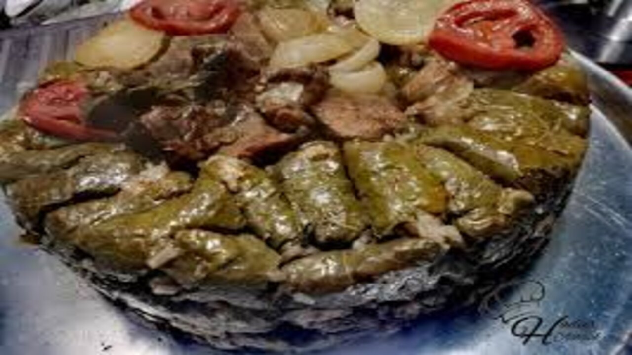 الاكل التقليدي بتاع زمان.. طريقة عمل طاجن المحشي ورق العنب باللحمة بطعم أصلي